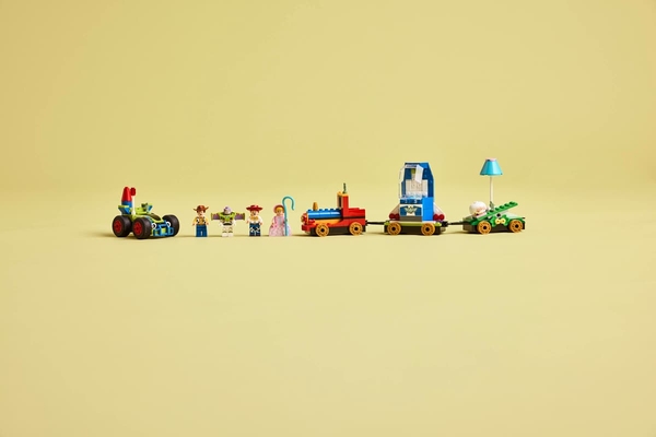 Конструктор LEGO Disney Pixar Святкування з Історії Іграшок: потяг і авто для перегонів